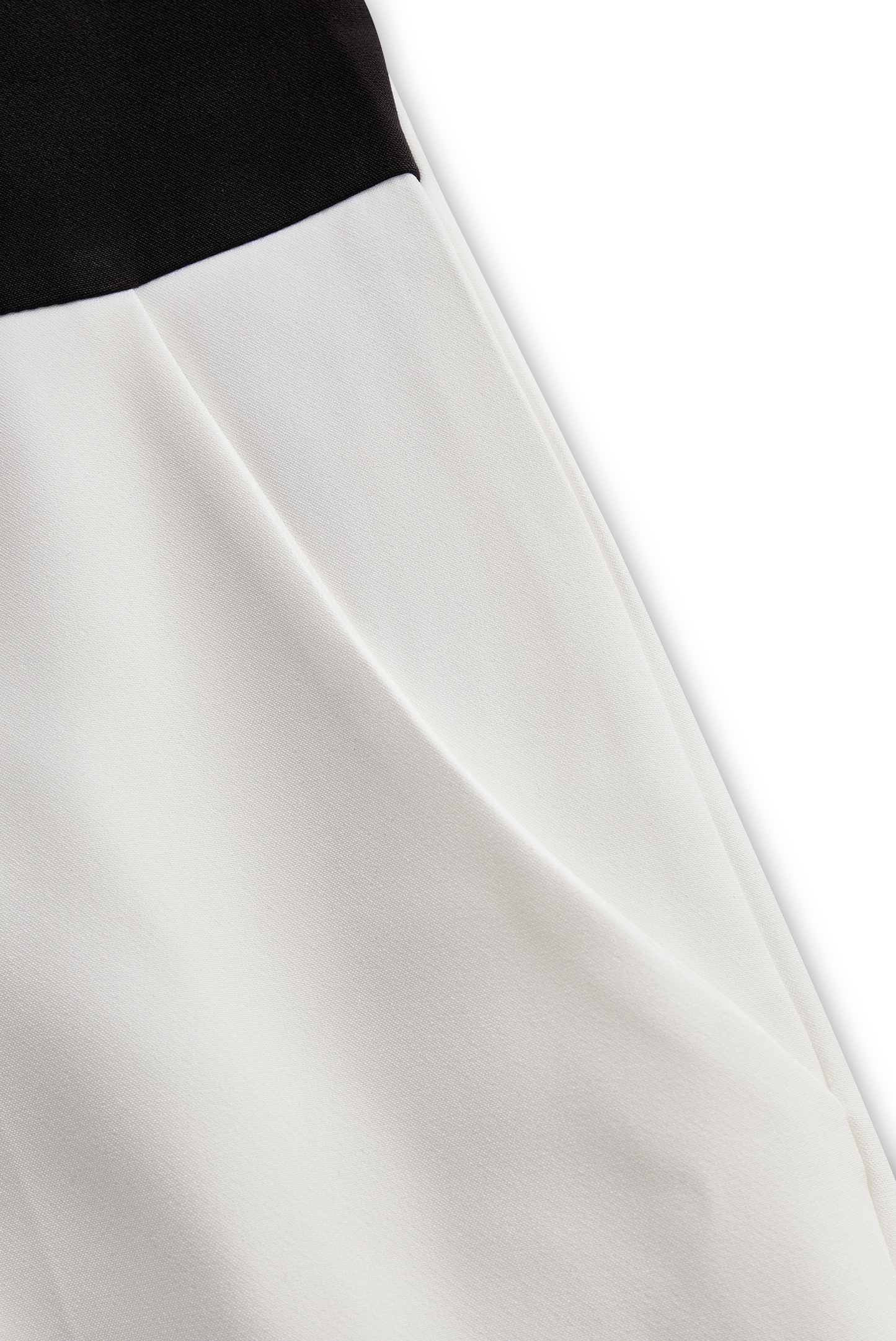 Sleek White Jumpsuit With Dual Button Detail And Black Lapel