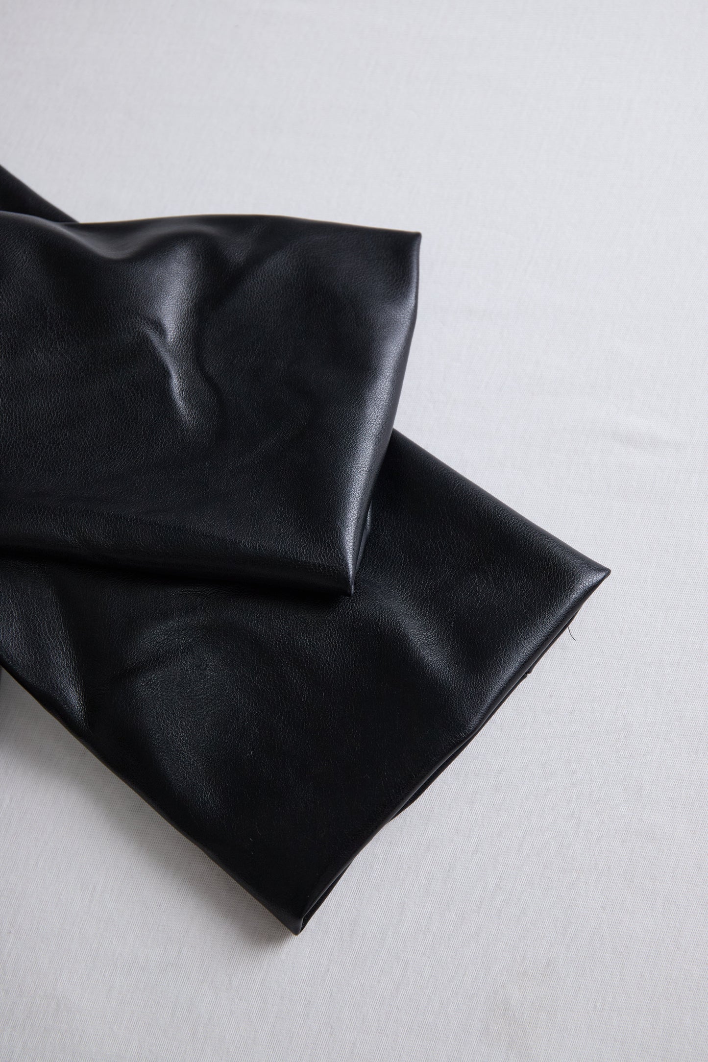 Sleek Black Faux Leather Wrap Mini Dress