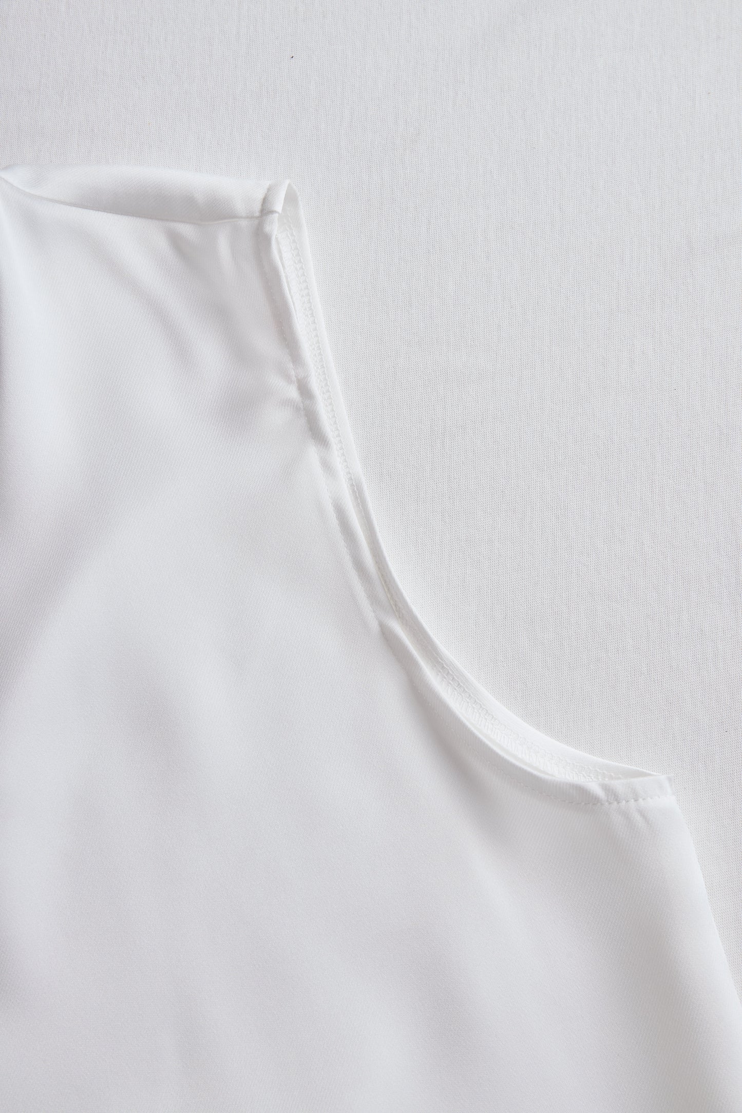 Modern Sleeveless White Blouse with 3D Rose Accents