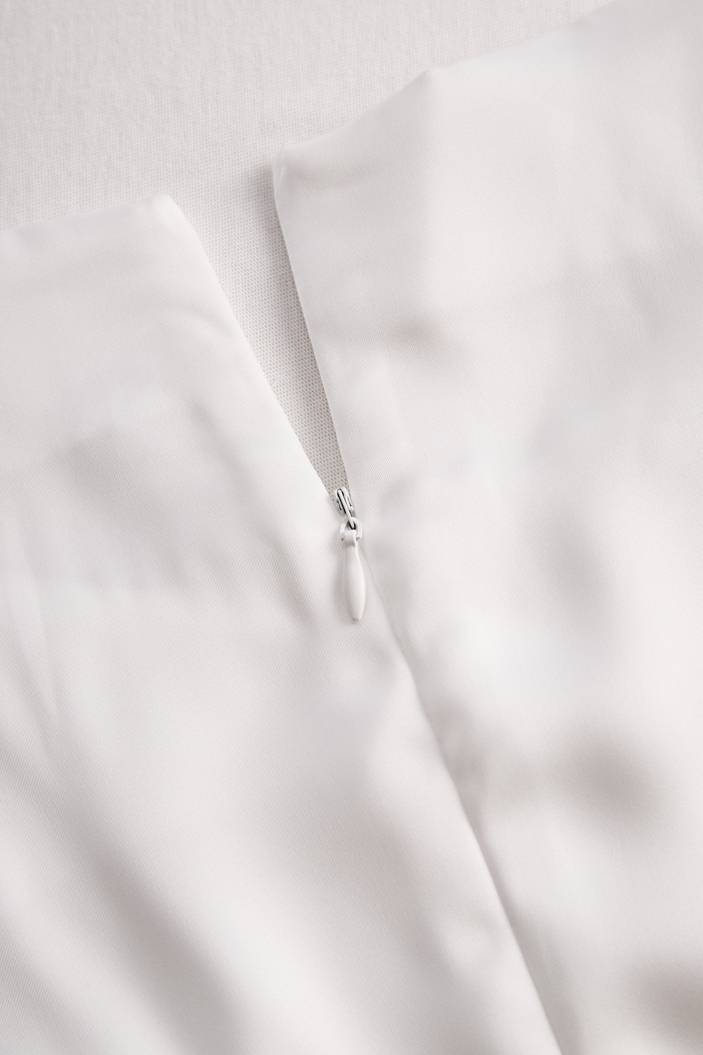 Elegant White Draped Top with Button Detail