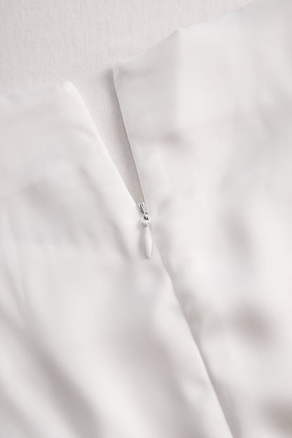 Elegant White Draped Top with Button Detail