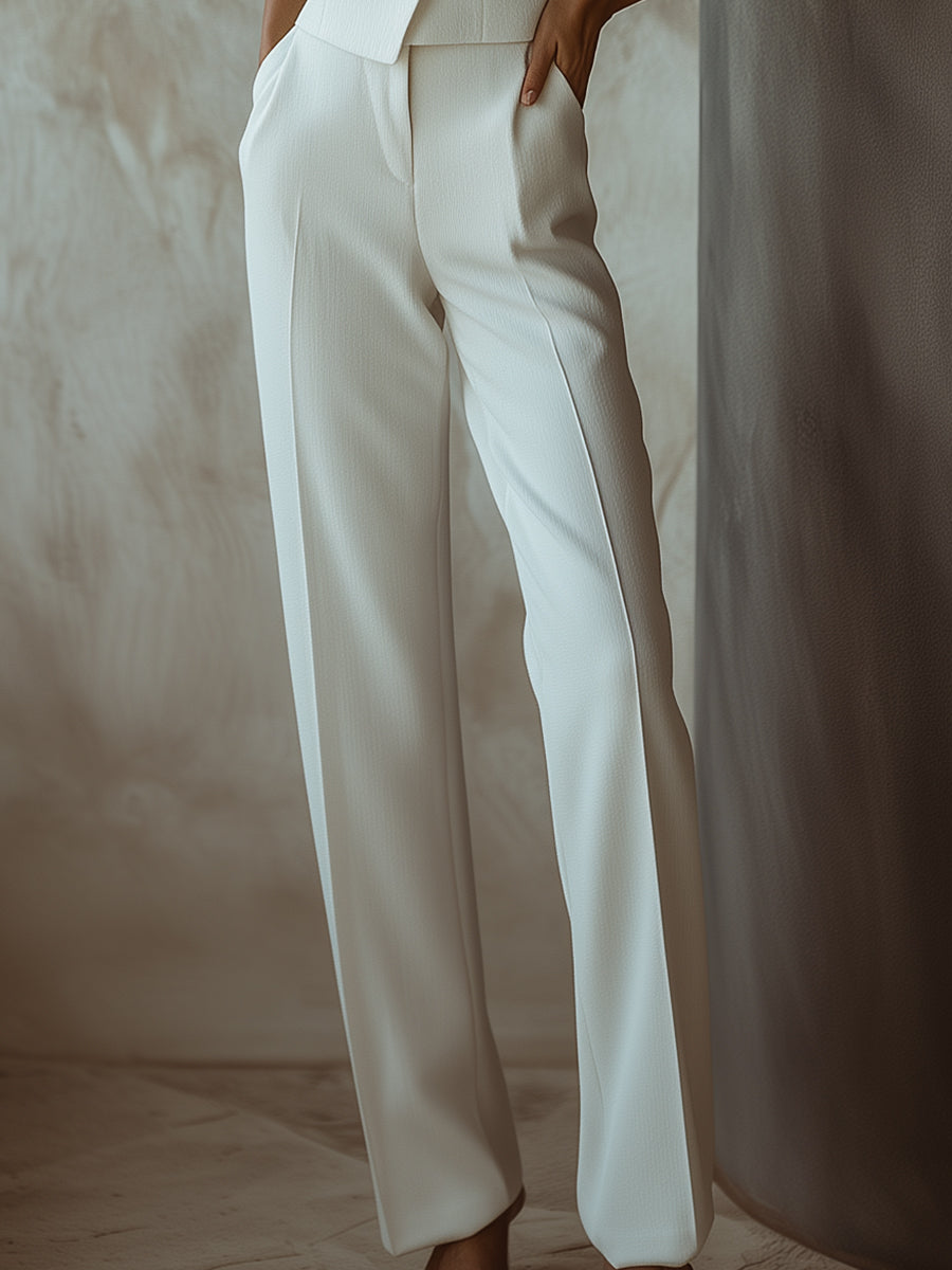 Elegant White Sleeveless Blazer with Matching Straight-Leg Pants